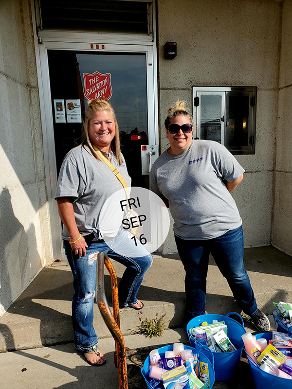 NTC Cosmetology instructors deliver baskets of personal care items to the Salvation Army.