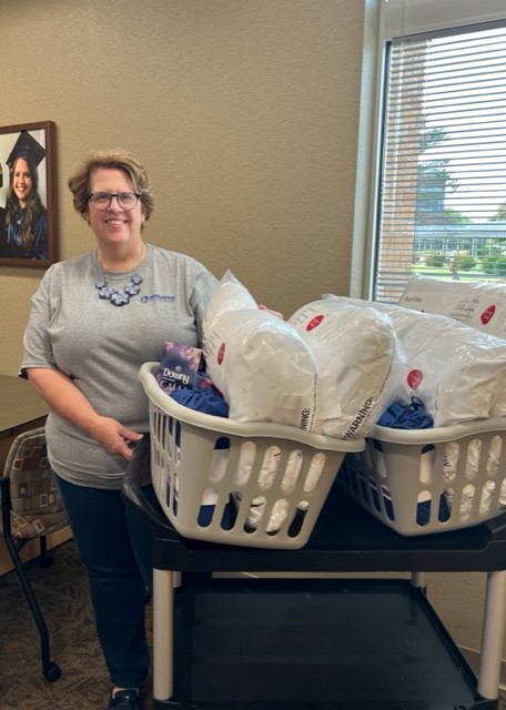 Dr. Jeannie Worden, NTC President, assembled welcome baskets for the United Way.