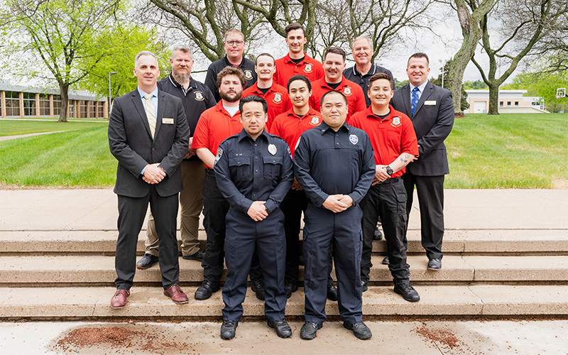 Leaders from NTC’s School of Public Safety stand with the graduates following the commencement ceremony in Wausau, Wis.