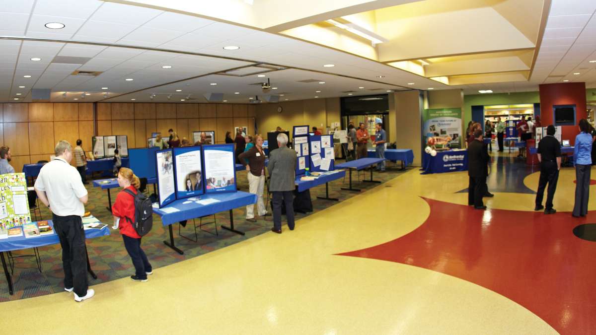 People gathered at the Science and Engineering Festival at NTC in the Cafeteria