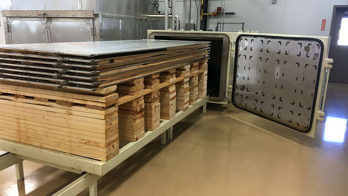 Vacuum Kiln with stacks of lumber