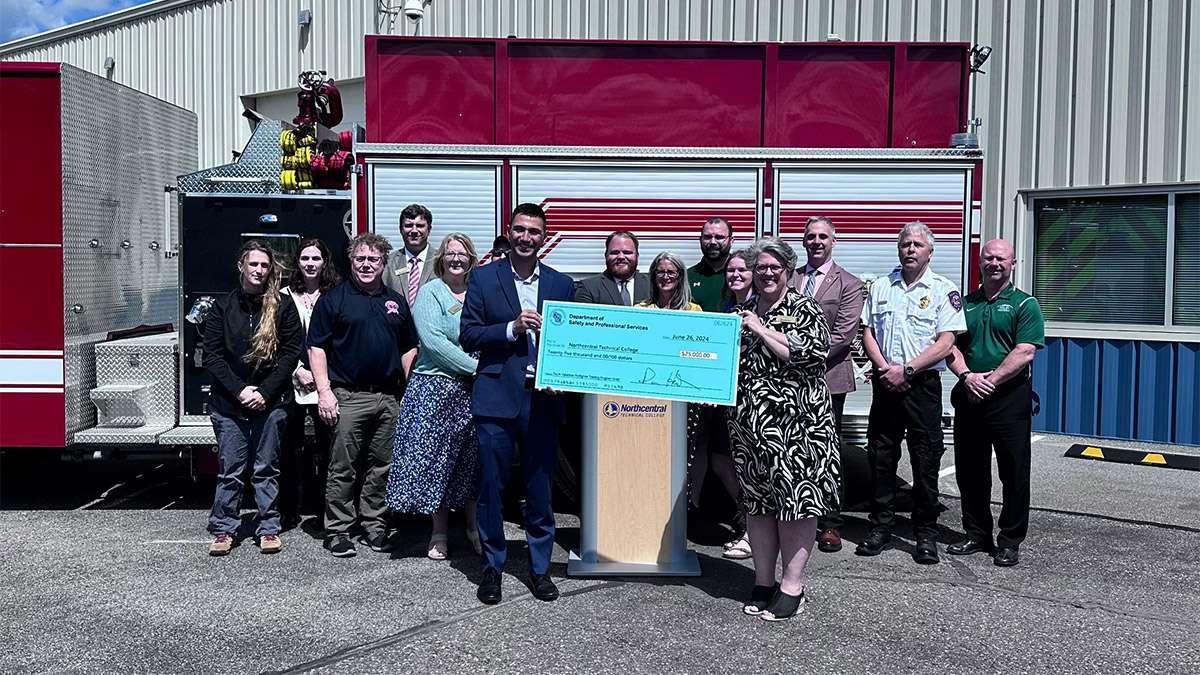Dr. Worden Stands With Firefighters and NTC Faculty and Accepts a Firefighter Grant.