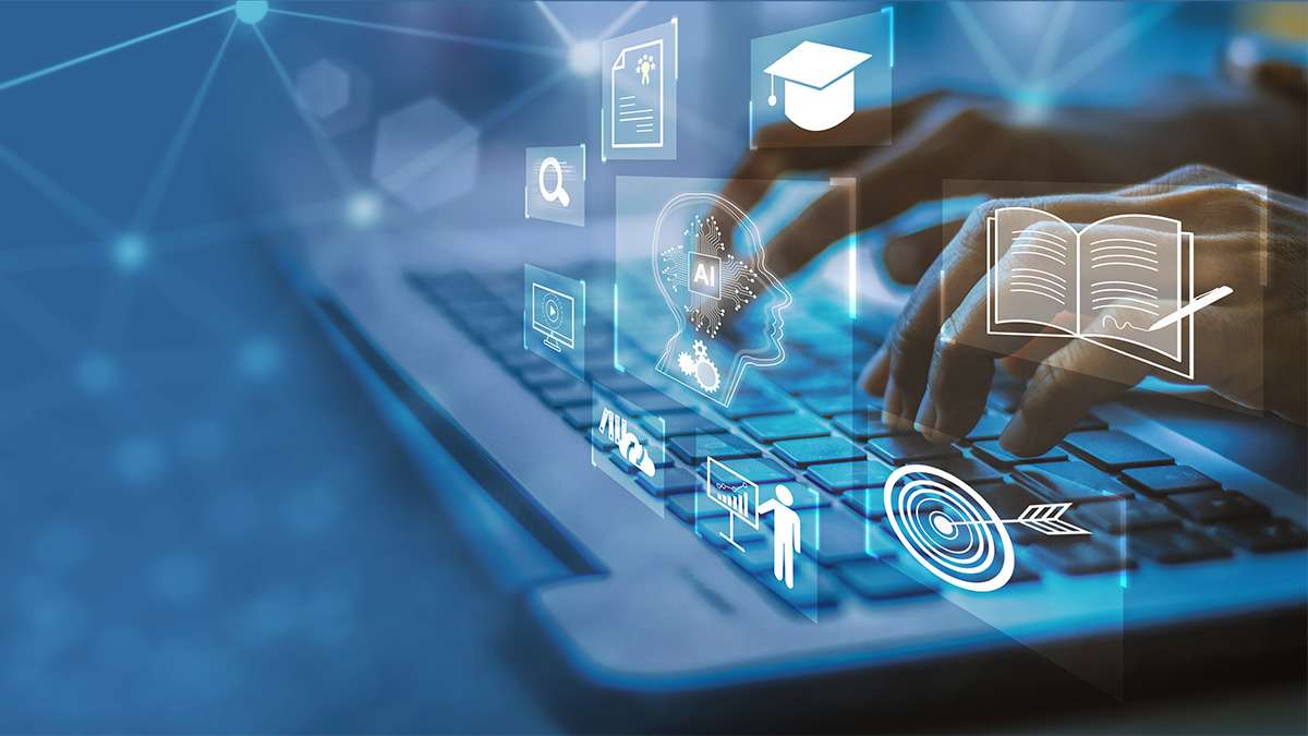 Hands typing on a laptop keyboard, surrounded by glowing white digital education and information icons on a blue background.