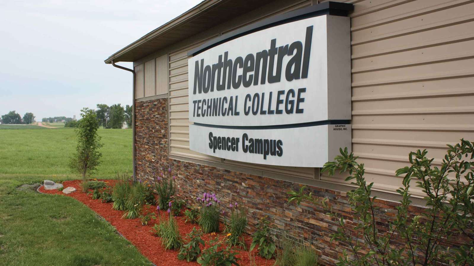 Sign on the exterior of the Spencer Campus