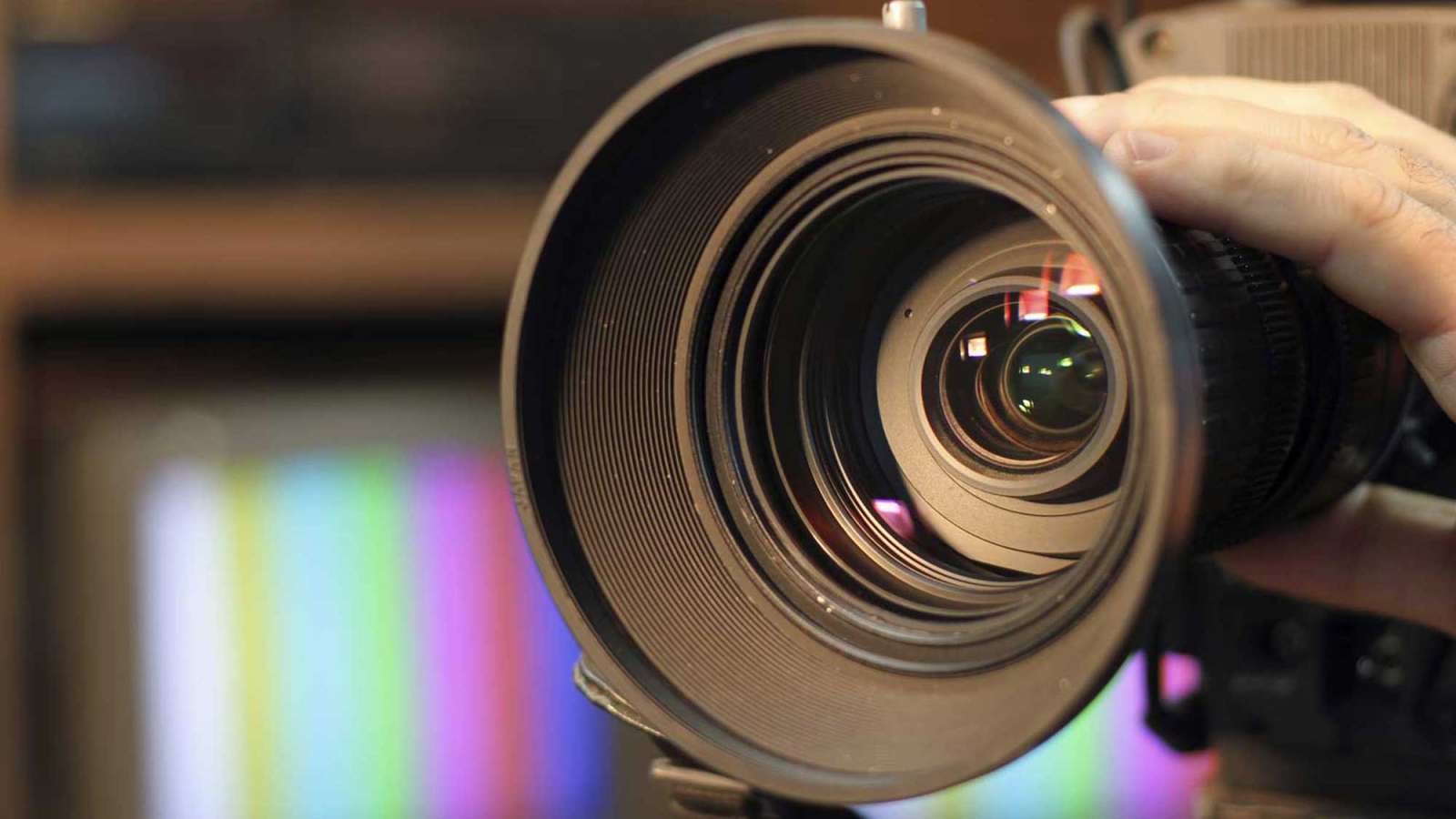 A closeup shot of a lens of a video camera.