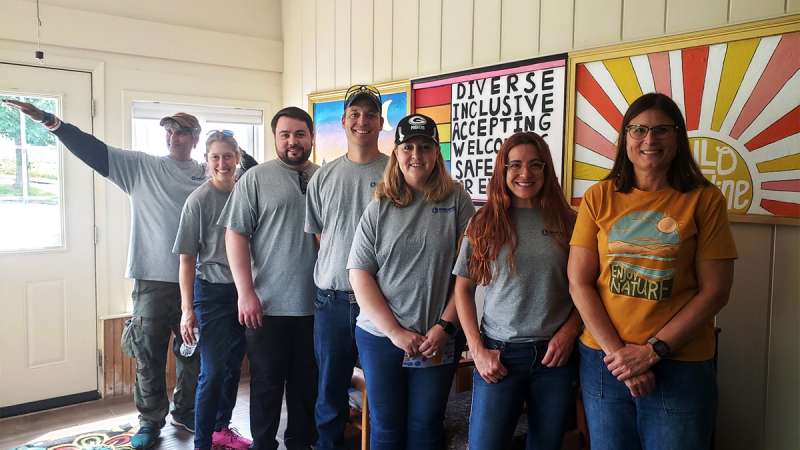 Leaders of NTC’s Alternative High School stand together after a day of service at Kat’s Hillcrest House.