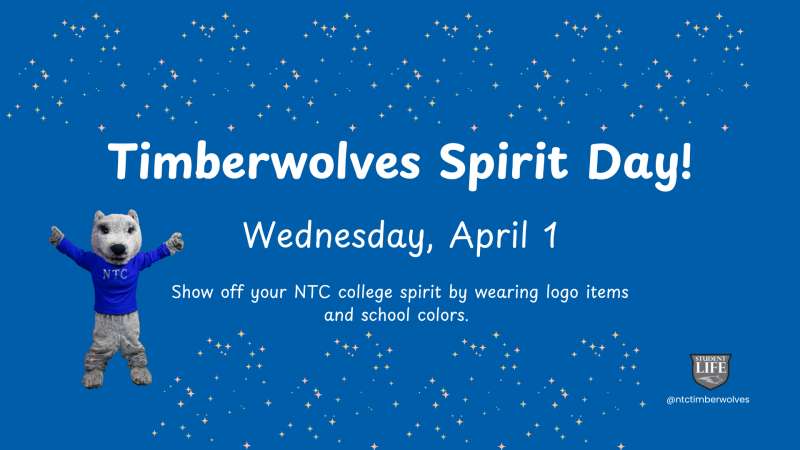 Blue celebratory banner with a waving timberwolf mascot, white text "Timberwolves Spirit Day! Wednesday, April 1," confetti accents and a small NTC school logo bottom-right.