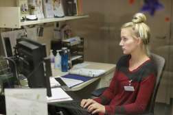 Rachel Meier working on her computer at Marshfield Clinic