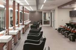 A wide interior view of the inside of Studio Max Salon and Spa