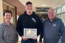 Gloria and Larry Hammond present the first Lorin Hammond Plumbing Apprenticeship Scholarship to Bryce Seubert at NTC.