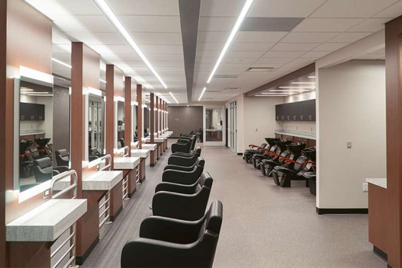 A wide interior view of the inside of Studio Max Salon and Spa