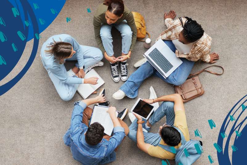 Overhead view of a diverse group of five students sitting in a circle on carpeted floor, studying together with notebooks, a laptop, and a tablet, surrounded by abstract blue graphic elements.
