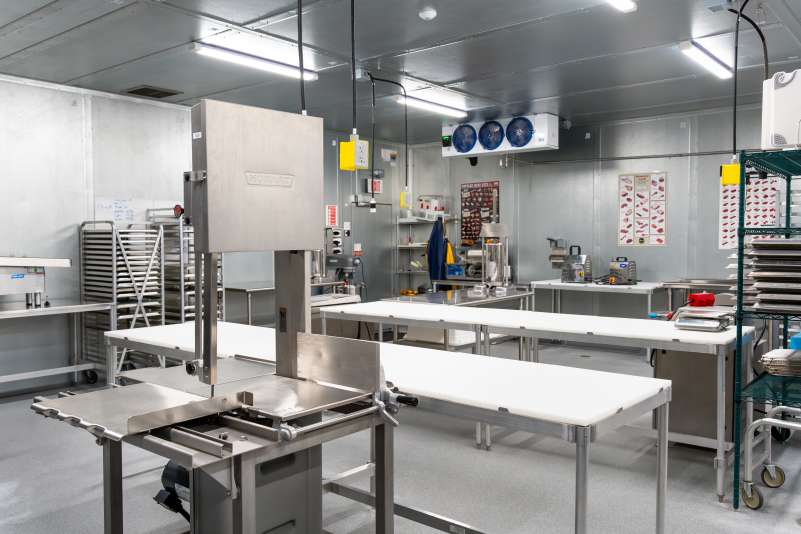 A band saw within the Pasture to Plate Butchery Cold Lab