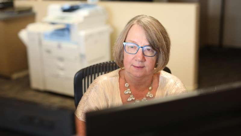 Lady working at a computer