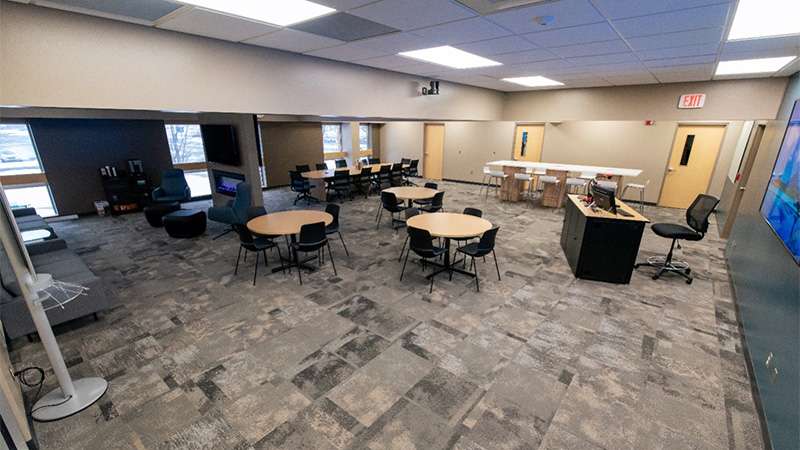 A wide internal view of the Center for Innovation & Inclusion within the Timberwolf Learning Commons.