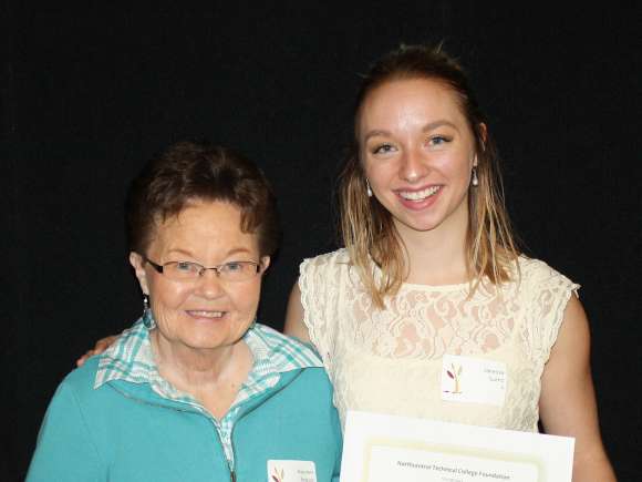A student receives the Beth Ferrel Memorial Scholarship