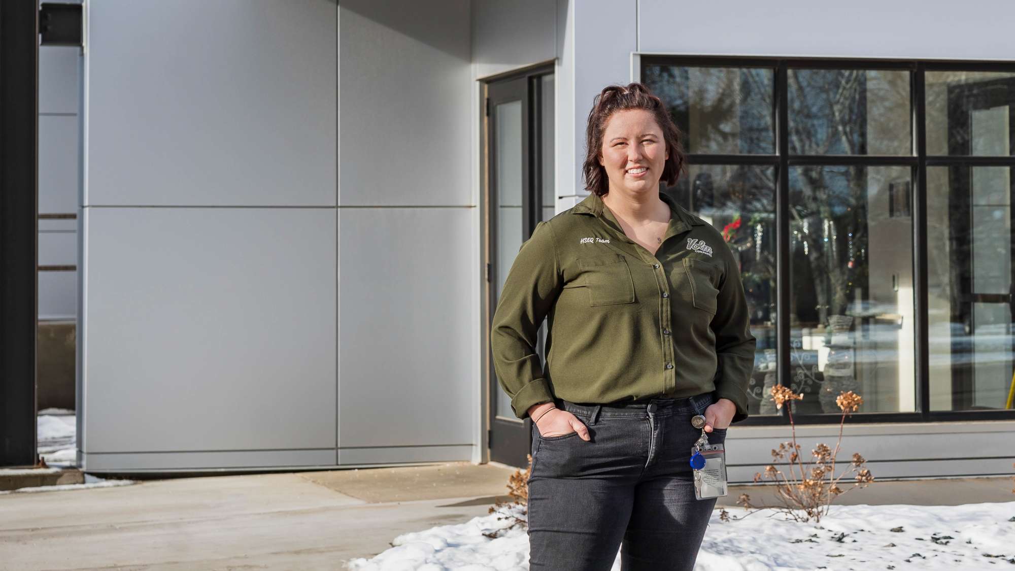 Hanna Butler standing outside of her employer, Volm Companies’, office.