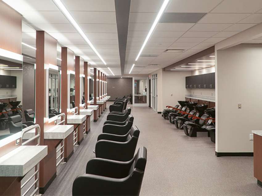 A wide interior view of the inside of Studio Max Salon and Spa